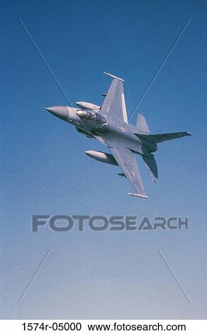 Low angle view of an F-16 Fighting Falcon in flight View Large Photo Image Stock Image - Low angle view of an F-16 Fighting Falcon in flight. Fotosearch