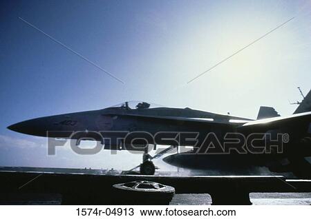 Low angle view of an F/A-18C Hornet strike fighter View Large Photo Image Stock Image - Low angle view of an F/A-18C Hornet strike fighter. Fotosearch
