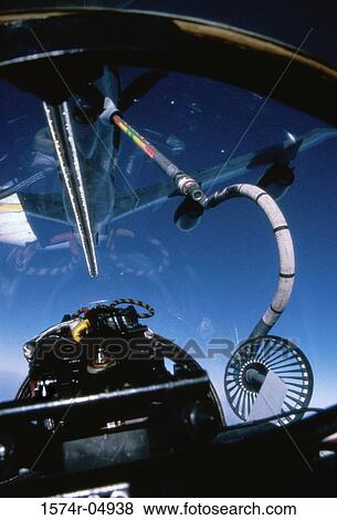 Mid-air refueling of a fighter plane View Large Photo Image Stock Photo - Mid-air refueling of a fighter plane. Fotosearch