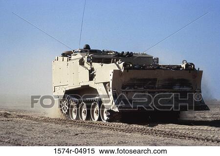 Military land vehicle in the desert View Large Photo Image Stock Photography - Military land vehicle in the desert. Fotosearch