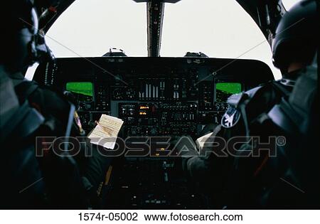 Rear view of two fighter pilots in a B-1B aircraft cockpit View Large Photo Image Stock Image - Rear view of two fighter pilots in a B-1B aircraft cockpit. Fotosearch