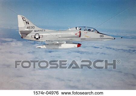 Side profile of an A-4 Skyhawk jet fighter in flight View Large Photo Image Stock Photograph - Side profile of an A-4 Skyhawk jet fighter in flight. Fotosearch