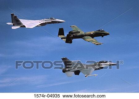Squadron of three fighter planes flying in formation View Large Photo Image Stock Photography - Squadron of three fighter planes flying in formation. Fotosearch