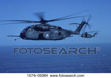 Two MH-53E Sea Dragons flying over the Persian Gulf View Large Photo Image Picture - Two MH-53E Sea Dragons flying over the Persian Gulf. Fotosearch