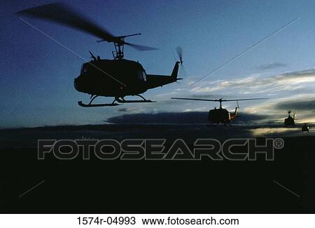 UH-1H Iroquois helicopters flying in formation, Eielson Air Force Base, Alaska, USA View Large Photo Image Stock Image - UH-1H Iroquois helicopters flying in formation, Eielson Air Force Base, Alaska, USA. Fotosearch