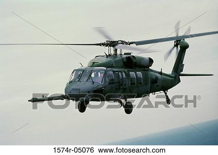 UH60L military helicopter in flight View Large Photo Image Stock Photograph - UH60L military helicopter in flight. Fotosearch