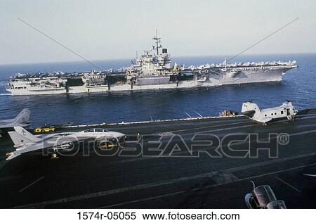 USS Saratoga and the USS John F. Kennedy sailing alongside in the sea View Large Photo Image Stock Photography - USS Saratoga and the USS John F. Kennedy sailing alongside in the sea. Fotosearch