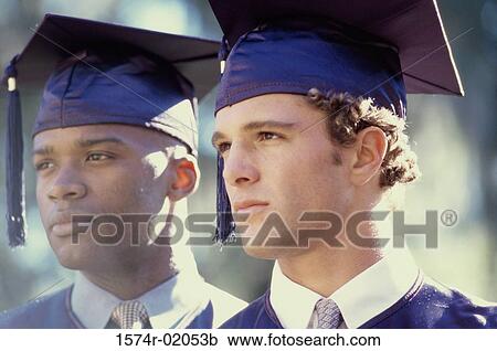 Close-up of two young men in graduation outfits View Large Photo Image Stock Image - Close-up of two young men in graduation outfits. Fotosearch