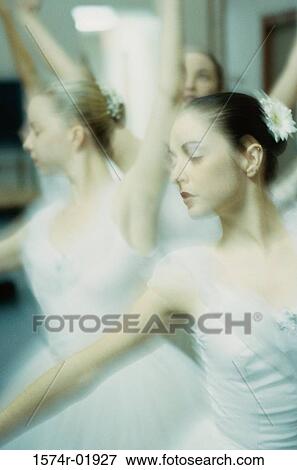 Close-up of young woman performing ballet View Large Photo Image Stock Photo - Close-up of young woman performing ballet. Fotosearch