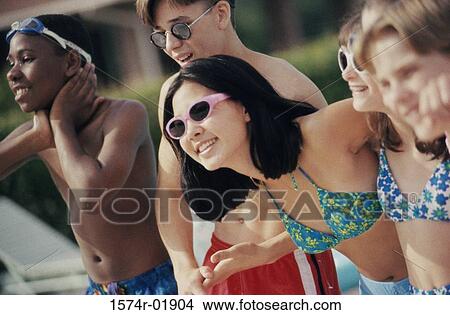 Group of teenagers on the beach View Large Photo Image Picture - Group of teenagers on the beach. Fotosearch