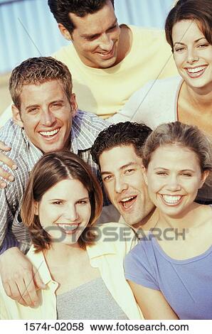 Portrait of a group of young men and women View Large Photo Image Stock Photo - Portrait of a group of young men and women. Fotosearch