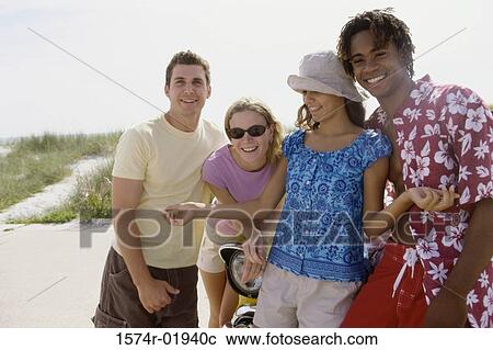 Stock Image - Portrait of teenagers smiling. Fotosearch
