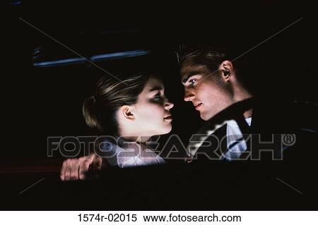 Teenage couple sitting in a car looking at each other View Large Photo Image Stock Photography - Teenage couple sitting in a car looking at each other. Fotosearch
