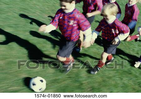 Children playing soccer View Large Photo Image Stock Image - Children playing soccer. Fotosearch