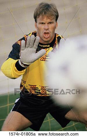 Stock Image - Goalie standing with his hand out. Fotosearch