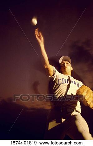 Man throwing a baseball View Large Photo Image Stock Photo - Man throwing a baseball. Fotosearch