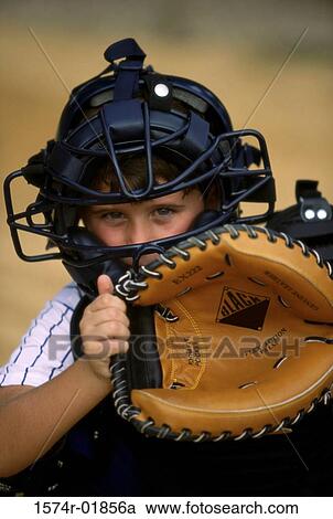 Stock Image - Portrait of a boy holding a baseball glove. Fotosearch