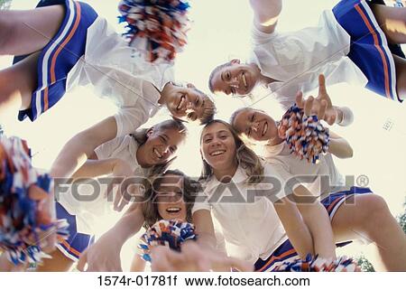 Stock Image - Portrait of a group of cheerleaders. Fotosearch