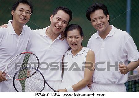Picture - Portrait of a group of people at a tennis court. Fotosearch