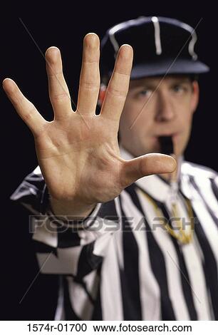 Portrait of a referee blowing a whistle View Large Photo Image Stock Image - Portrait of a referee blowing a whistle. Fotosearch