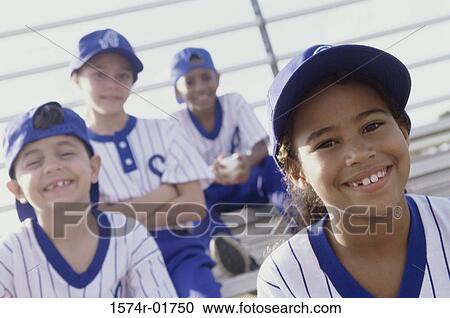 Stock Image - Portrait of boys and girls from a little league baseball team. Fotosearch