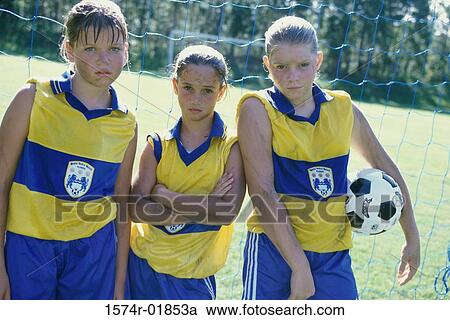 Portrait of three girls on a soccer team View Large Photo Image Stock Image - Portrait of three girls on a soccer team. Fotosearch