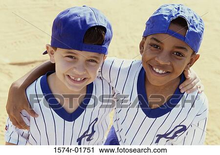 Portrait of two boys from a little league baseball team View Large Photo Image Stock Image - Portrait of two boys from a little league baseball team. Fotosearch