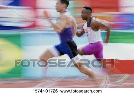 Side profile of two young men running View Large Photo Image Stock Photograph - Side profile of two young men running. Fotosearch