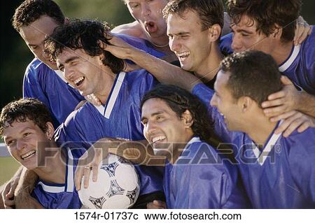 Stock Image - Soccer team together. Fotosearch