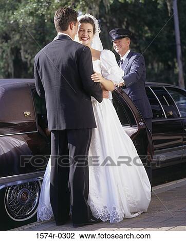 Bride and bridegroom at a wedding View Large Photo Image Stock Image - Bride and bridegroom at a wedding. Fotosearch