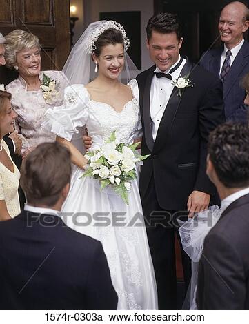 Stock Image - Bride and bridegroom at a wedding. Fotosearch
