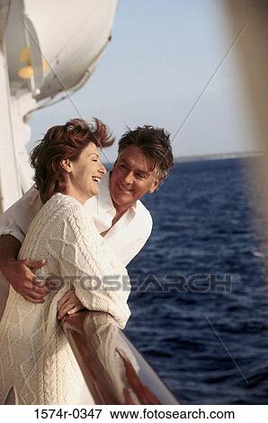 Couple on a ship View Large Photo Image Stock Photo - Couple on a ship. Fotosearch