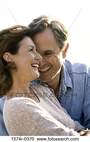 Couple smiling together View Large Photo Image Stock Image - Couple smiling together. Fotosearch