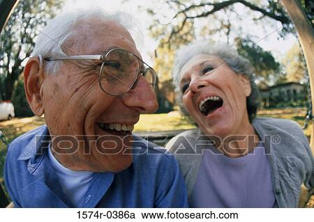 Stock Image - Senior couple laughing. Fotosearch