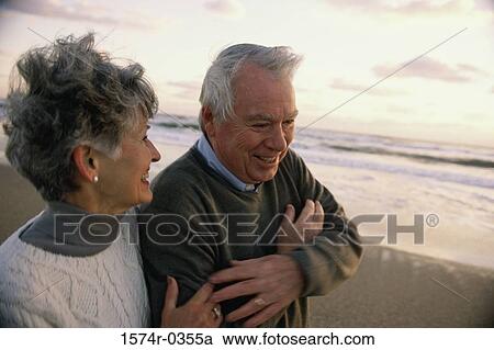 Senior couple on the beach View Large Photo Image Stock Image - Senior couple on the beach. Fotosearch