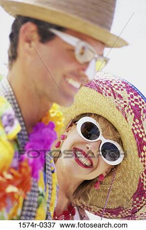 Young couple smiling View Large Photo Image Stock Photo - Young couple smiling. Fotosearch