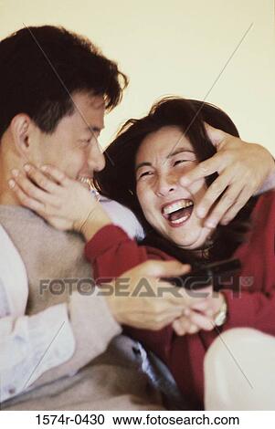 Young couple together smiling View Large Photo Image Stock Image - Young couple together smiling. Fotosearch