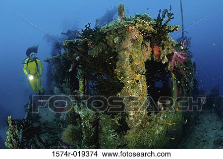 Scuba diver swimming underwater View Large Photo Image Picture - Scuba diver swimming underwater. Fotosearch