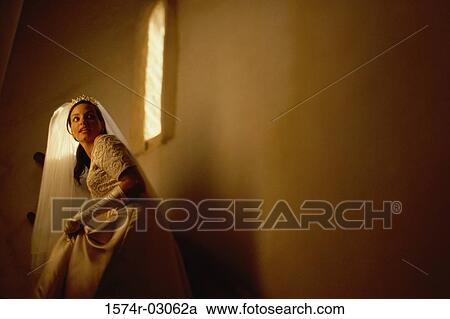 Bride walking up stairs View Large Photo Image Stock Image - Bride walking up stairs. Fotosearch