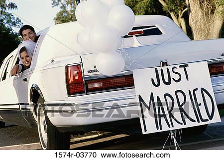 Newlywed couple waving from a limousine View Large Photo Image Stock Image - Newlywed couple waving from a limousine. Fotosearch