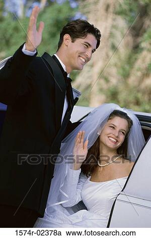 Newlywed couple waving View Large Photo Image Stock Image - Newlywed couple waving. Fotosearch