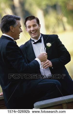 Newlywed young man with his father View Large Photo Image Stock Image - Newlywed young man with his father. Fotosearch
