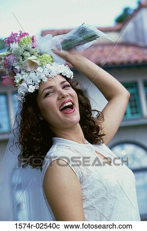Newlywed young woman preparing to toss the bouquet View Large Photo Image Stock Image - Newlywed young woman preparing to toss the bouquet. Fotosearch