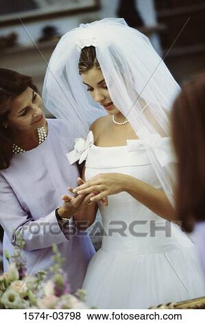 Newlywed young woman with her mother View Large Photo Image Stock Photo - Newlywed young woman with her mother. Fotosearch