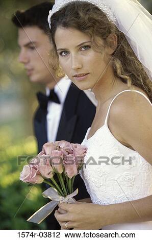 Portrait of a newlywed couple View Large Photo Image Stock Image - Portrait of a newlywed couple. Fotosearch