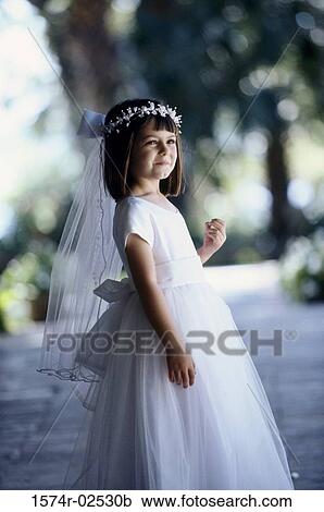 Side profile of a flower girl smiling View Large Photo Image Stock Image - Side profile of a flower girl smiling. Fotosearch