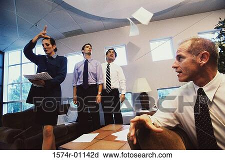 Business executives at a meeting in an office View Large Photo Image Stock Image - Business executives at a meeting in an office. Fotosearch