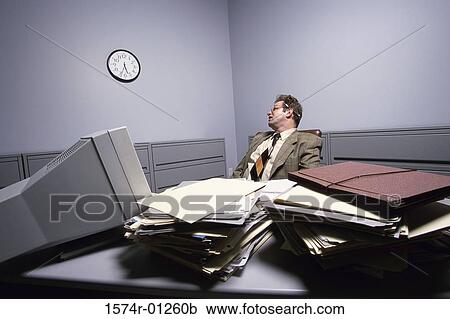 Businessman in an office View Large Photo Image Stock Image - Businessman in an office. Fotosearch