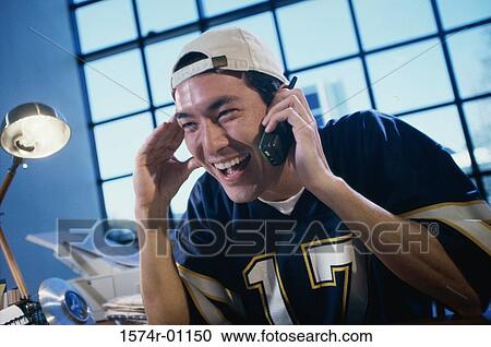 Businessman talking on a mobile phone View Large Photo Image Stock Image - Businessman talking on a mobile phone. Fotosearch