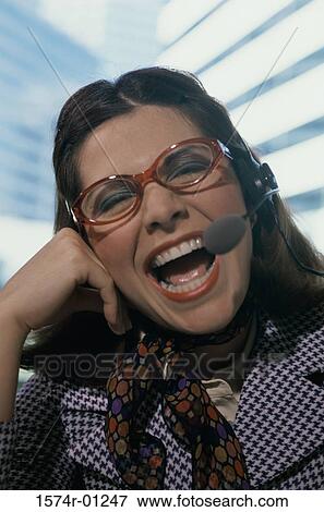 Stock Photo - Portrait of a business woman smiling. Fotosearch